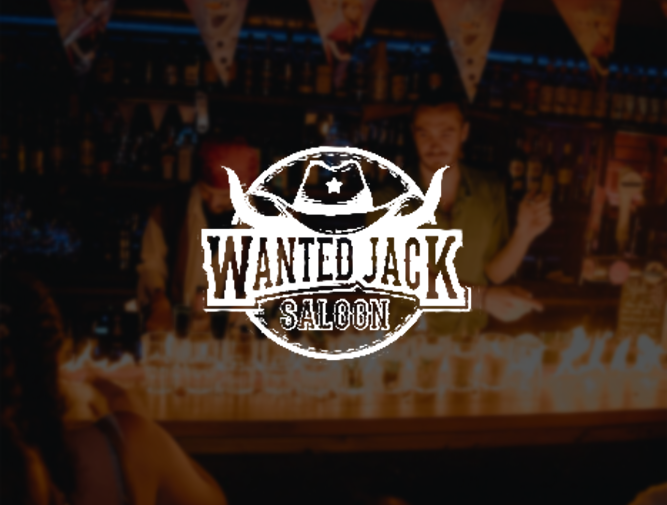 logo wanted jack saloon sur un fond flouter